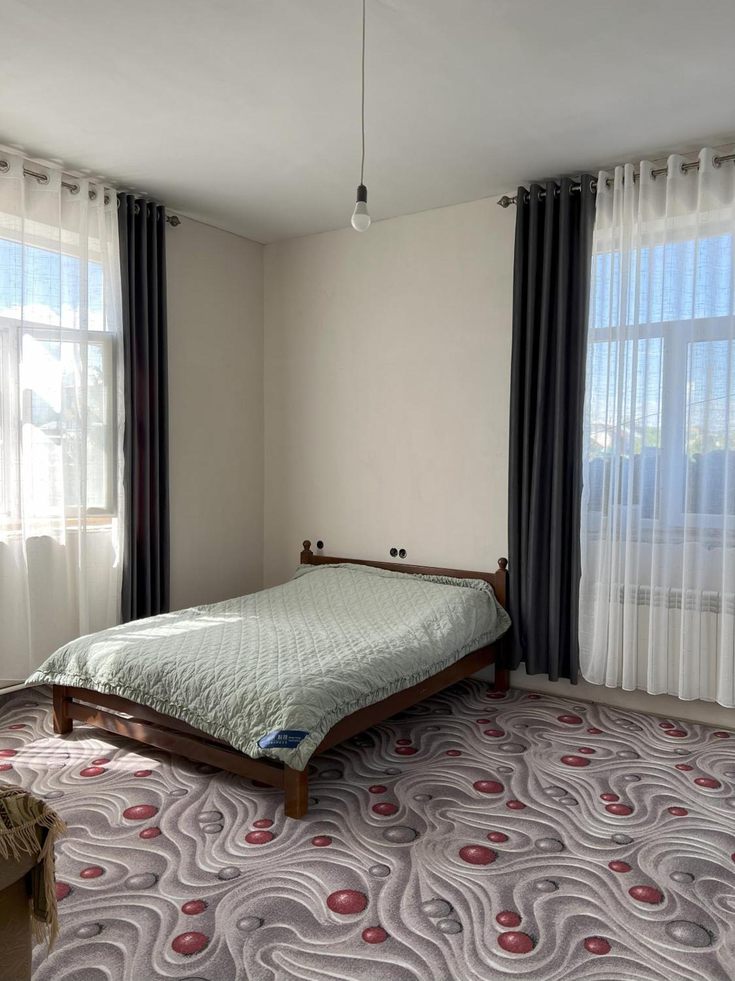 Emir Guest House In Karakol Exterior photo